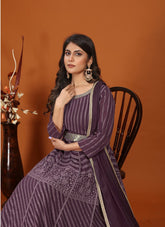 Pleasant looking wine colour gown